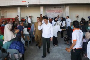 Ribuan KK Warga Bengkong & Sekupang Sambut HMR & Marlin Bagikan Beras Gratis